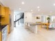 LOCK UP AND LEAVE FREEHOLD-- Very spacious and contemporary easy living home--LOW MAINTENANCE